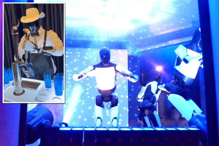 Elon Musk's Optimus humanoid robots steal the show at Tesla event: 'This will be the biggest product ever'

